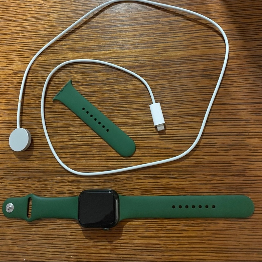 Series 7 Apple Watch 45 mm green changeable band.